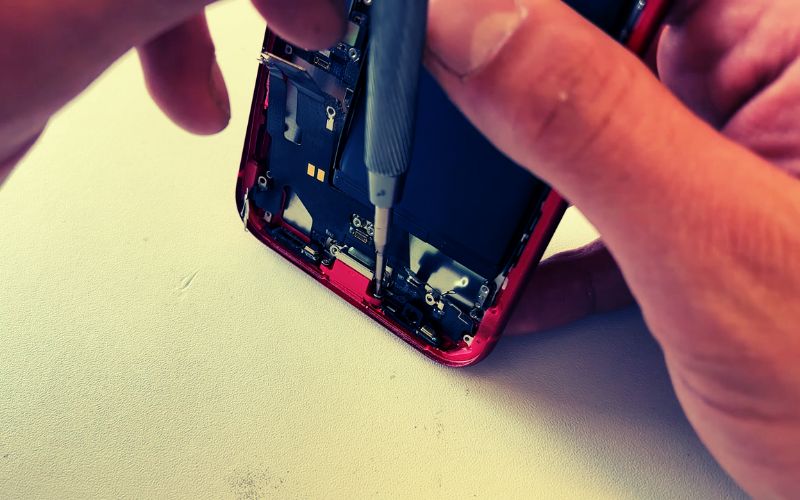 open charging port with screwdriver